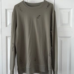 Green long sleeve shirt with cutting slits
